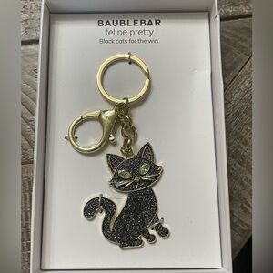 BaubleBar "Feline Pretty" black cat bag charm and keychain.